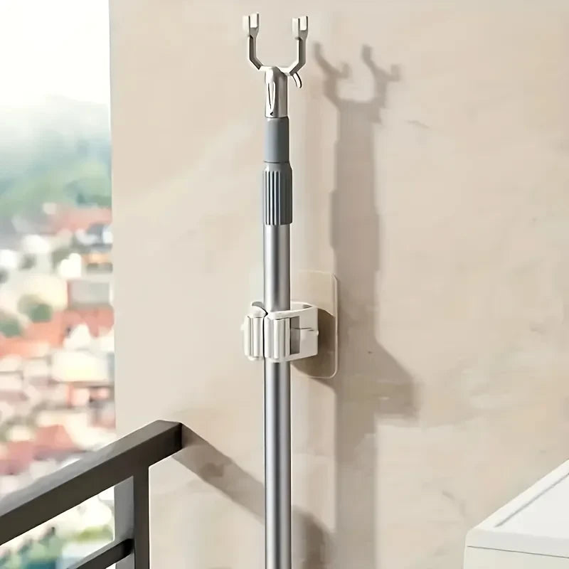 Soporte Adhesivo para Escobas